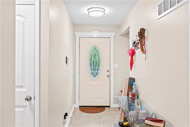 15205 E 40th St S, Independence, MO 64055 - entryway featuring baseboards and light tile patterned flooring