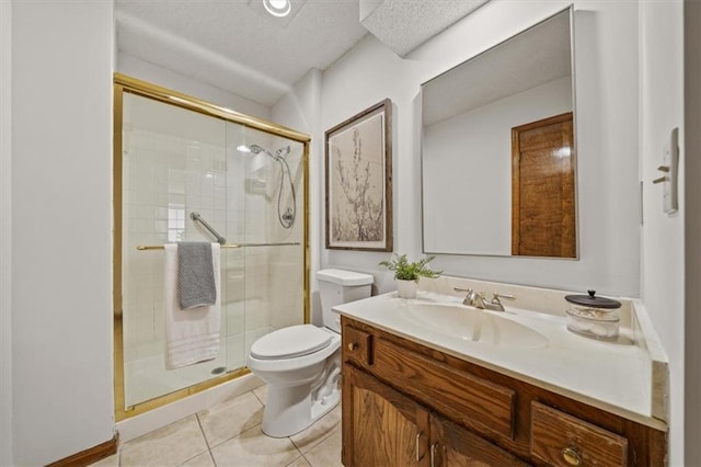 12332 W 105th Ter, Overland Park, KS 66215 - full bathroom with vanity, a stall shower, toilet, tile patterned flooring, and a textured ceiling