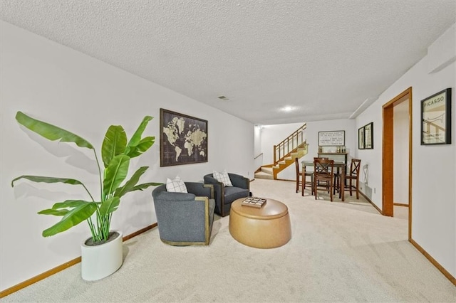 12332 W 105th Ter, Overland Park, KS 66215 - carpeted living area featuring stairs, a textured ceiling, and baseboards