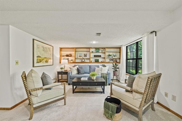 12332 W 105th Ter, Overland Park, KS 66215 - living area with carpet flooring, baseboards, and a textured ceiling