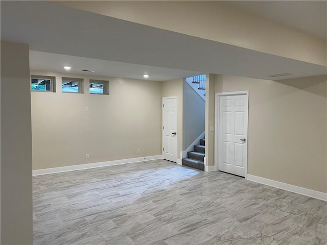 2320 NE 72nd St, Kansas City, MO 64118 - below grade area featuring stairs, baseboards, and recessed lighting