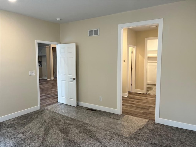 2320 NE 72nd St, Kansas City, MO 64118 - unfurnished bedroom featuring baseboards and carpet flooring