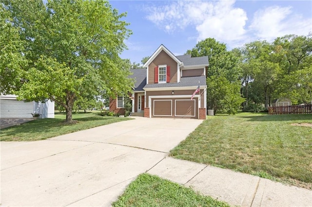 21480 W 121st St, Olathe, KS 66061 - traditional home featuring concrete driveway, an attached garage, and brick siding