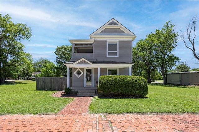915 Main St, Neodesha, KS 66757 - victorian home with a porch