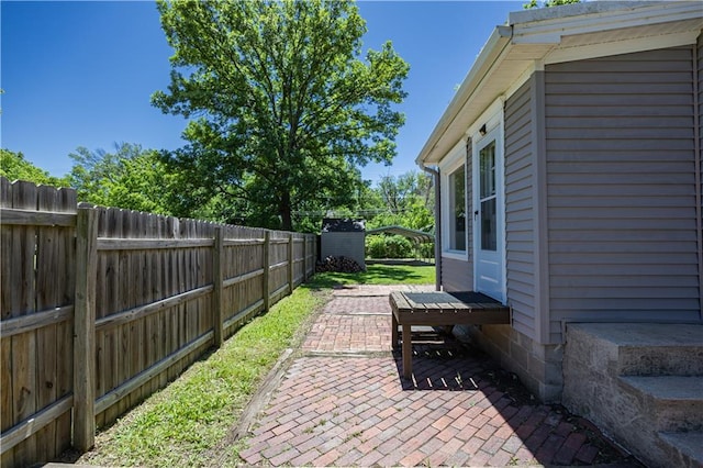 915 Main St, Neodesha, KS 66757 - fenced backyard featuring a patio