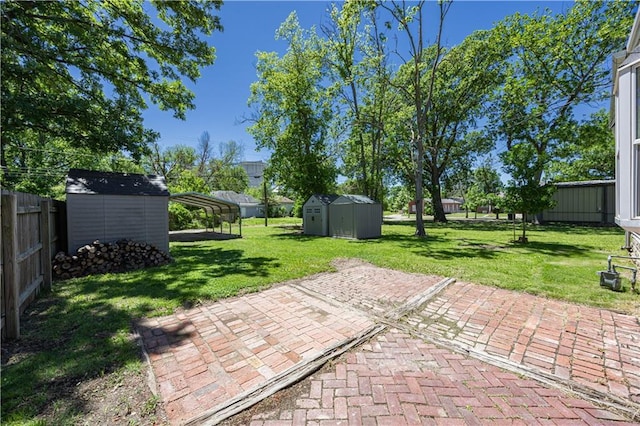 915 Main St, Neodesha, KS 66757 - view of patio / terrace featuring a carport