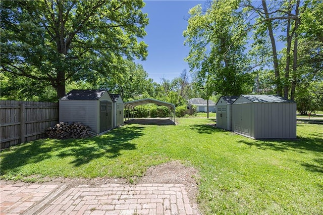 915 Main St, Neodesha, KS 66757 - view of yard featuring a carport