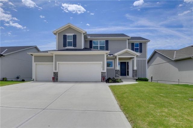 19629 W 196th St, Spring Hill, KS 66083 - view of front of house with a front lawn, driveway, a garage, and stone siding
