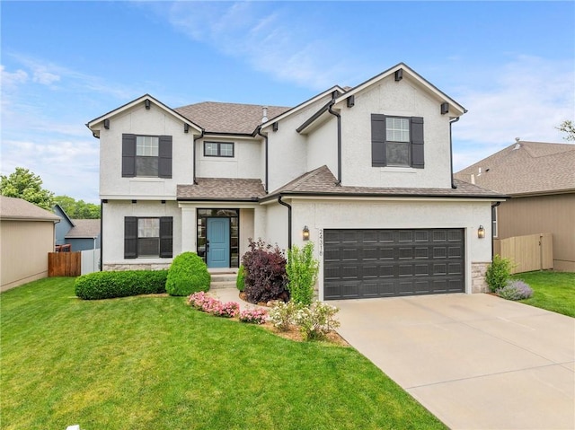 24318 W 91st Pl, Lenexa, KS 66227 - view of front of home featuring stucco siding, an attached garage, concrete driveway, and stone siding