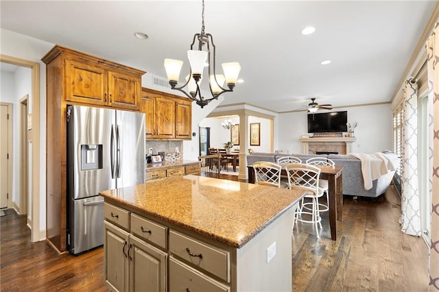 24318 W 91st Pl, Lenexa, KS 66227 - kitchen with stainless steel refrigerator with ice dispenser, ceiling fan, a center island, dark wood-style floors, and a chandelier