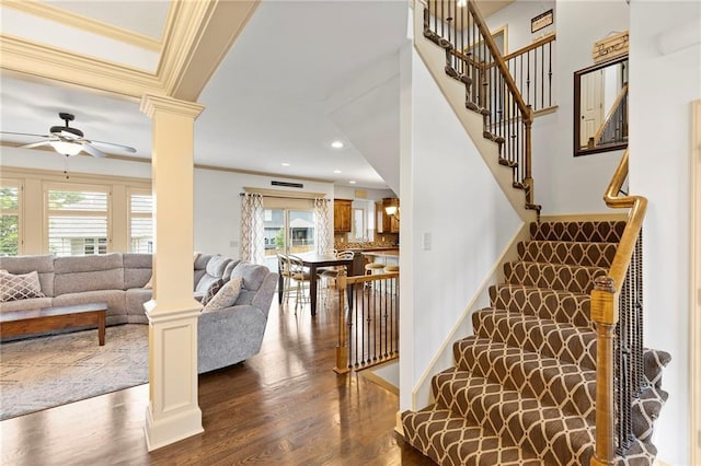24318 W 91st Pl, Lenexa, KS 66227 - stairway featuring crown molding, decorative columns, ceiling fan, wood finished floors, and recessed lighting