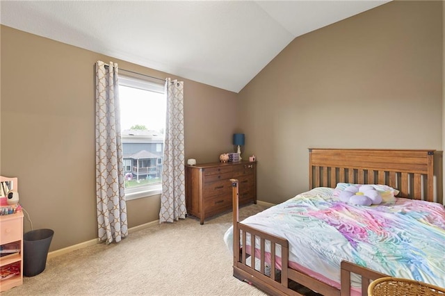 24318 W 91st Pl, Lenexa, KS 66227 - carpeted bedroom with lofted ceiling and baseboards