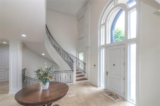 3109 W 118th St, Leawood, KS 66211 - foyer entrance featuring a high ceiling, stairs, and recessed lighting