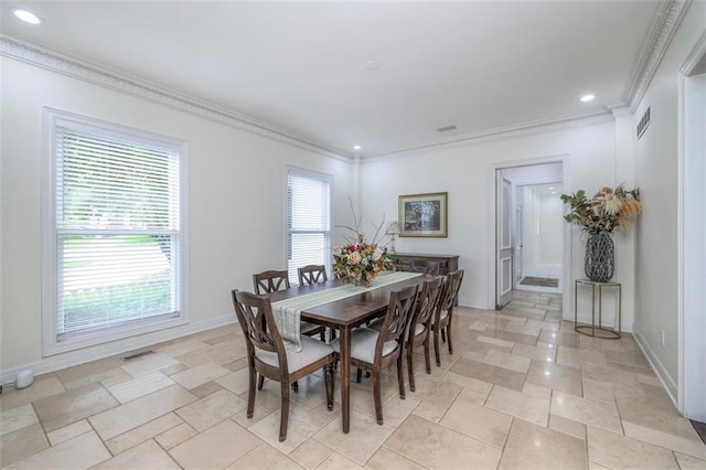 3109 W 118th St, Leawood, KS 66211 - dining space featuring crown molding, recessed lighting, and stone tile floors