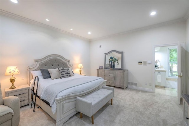 3109 W 118th St, Leawood, KS 66211 - bedroom with light colored carpet, recessed lighting, ornamental molding, and ensuite bath
