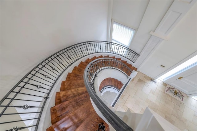 3109 W 118th St, Leawood, KS 66211 - stairs featuring a towering ceiling