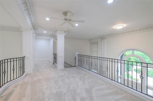 3109 W 118th St, Leawood, KS 66211 - hall with ornate columns, carpet, recessed lighting, an upstairs landing, and crown molding
