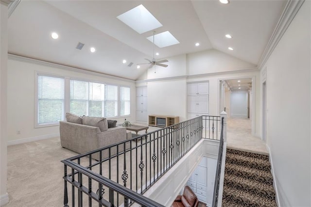 3109 W 118th St, Leawood, KS 66211 - stairs with carpet flooring, recessed lighting, a skylight, lofted ceiling, and crown molding