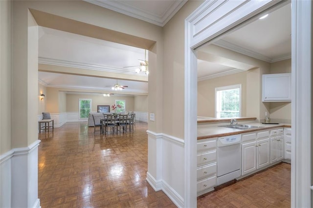 3109 W 118th St, Leawood, KS 66211 - kitchen featuring dishwasher, healthy amount of natural light, white cabinetry, ornamental molding, and a ceiling fan