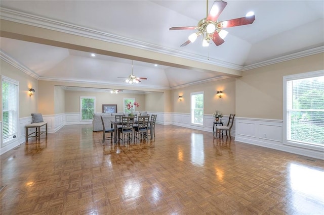 3109 W 118th St, Leawood, KS 66211 - dining room featuring vaulted ceiling, ceiling fan, healthy amount of natural light, and wainscoting