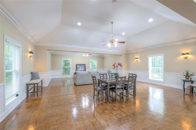 3109 W 118th St, Leawood, KS 66211 - dining room featuring ceiling fan, vaulted ceiling, wainscoting, and a decorative wall