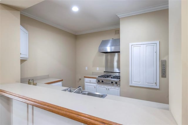 3109 W 118th St, Leawood, KS 66211 - kitchen with extractor fan, crown molding, stainless steel gas cooktop, light countertops, and white cabinets