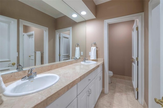 3109 W 118th St, Leawood, KS 66211 - bathroom featuring double vanity, crown molding, and recessed lighting
