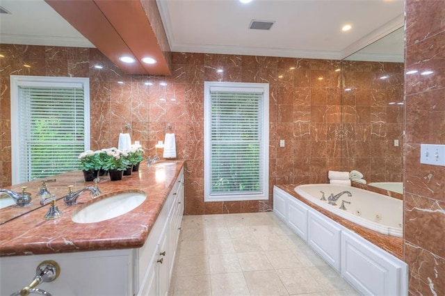 3109 W 118th St, Leawood, KS 66211 - full bathroom featuring ornamental molding, tile walls, double vanity, a whirlpool tub, and tile patterned floors