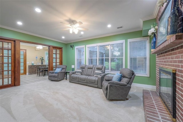 3109 W 118th St, Leawood, KS 66211 - carpeted living area with french doors, ceiling fan, a brick fireplace, ornamental molding, and recessed lighting