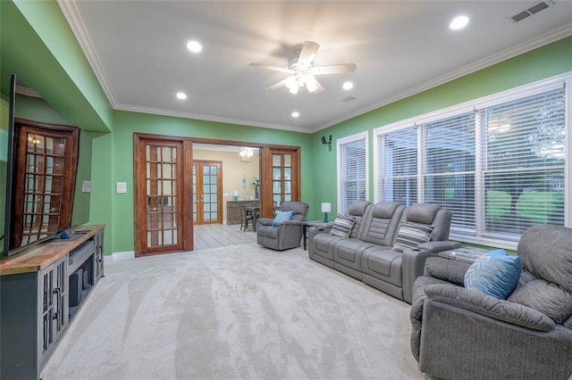 3109 W 118th St, Leawood, KS 66211 - living area with french doors, ceiling fan, ornamental molding, light colored carpet, and recessed lighting
