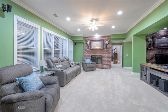 3109 W 118th St, Leawood, KS 66211 - living room featuring a brick fireplace, carpet floors, recessed lighting, ornamental molding, and a ceiling fan