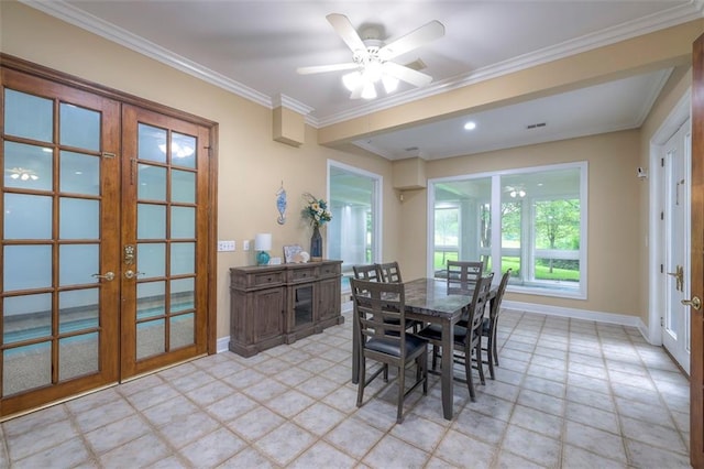 3109 W 118th St, Leawood, KS 66211 - dining space with french doors, ceiling fan, and crown molding