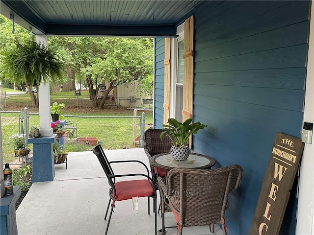2302 3rd Ave, Leavenworth, KS 66048 - covered porch with a yard