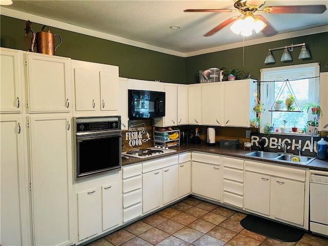 2302 3rd Ave, Leavenworth, KS 66048 - kitchen with black appliances, a sink, ceiling fan, white cabinets, and dark countertops