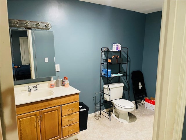 2302 3rd Ave, Leavenworth, KS 66048 - bathroom with toilet and vanity