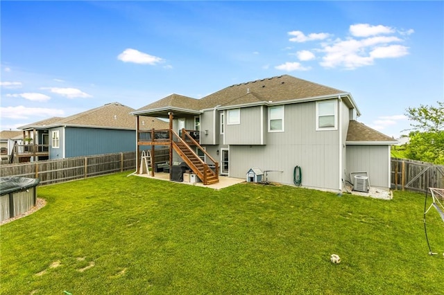2808 E Cedar Pl, Tonganoxie, KS 66086 - rear view of property with stairs, a patio area, roof with shingles, and a wooden deck