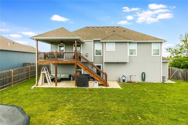 2808 E Cedar Pl, Tonganoxie, KS 66086 - back of property with a patio, stairs, ceiling fan, an outdoor hangout area, and roof with shingles