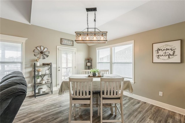 2808 E Cedar Pl, Tonganoxie, KS 66086 - dining space featuring wood finished floors and baseboards