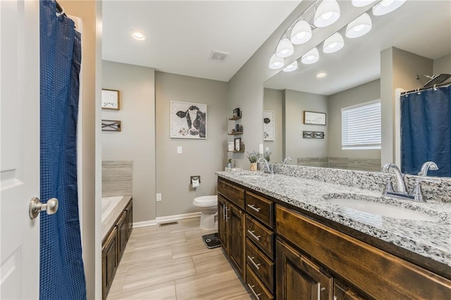 2808 E Cedar Pl, Tonganoxie, KS 66086 - bathroom with double vanity, toilet, baseboards, a bathtub, and curtained shower