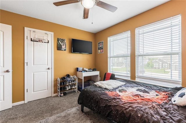 2808 E Cedar Pl, Tonganoxie, KS 66086 - carpeted bedroom featuring baseboards and ceiling fan