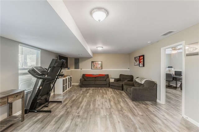 2808 E Cedar Pl, Tonganoxie, KS 66086 - exercise room featuring wood finished floors and baseboards
