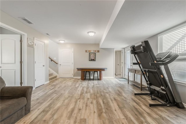 2808 E Cedar Pl, Tonganoxie, KS 66086 - exercise room featuring light wood-style floors and baseboards