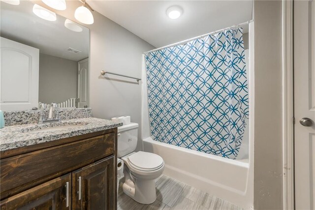 2808 E Cedar Pl, Tonganoxie, KS 66086 - full bathroom with vanity, shower / tub combo, and toilet