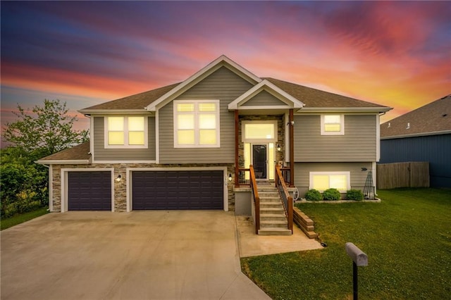 2808 E Cedar Pl, Tonganoxie, KS 66086 - bi-level home featuring concrete driveway, a garage, and roof with shingles