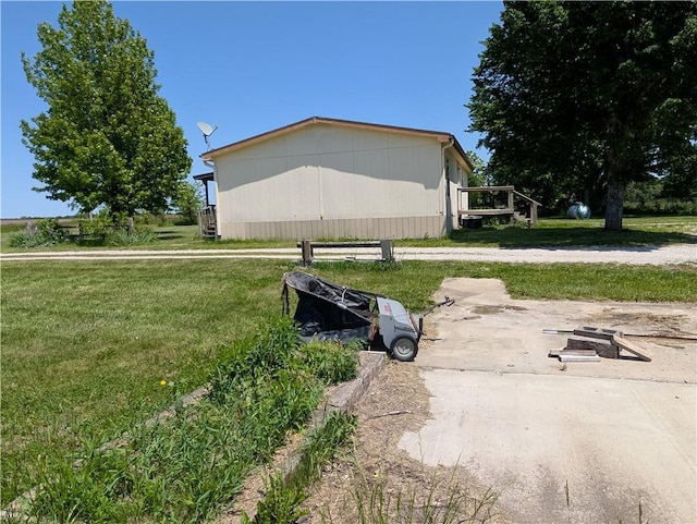 view of property exterior featuring a yard