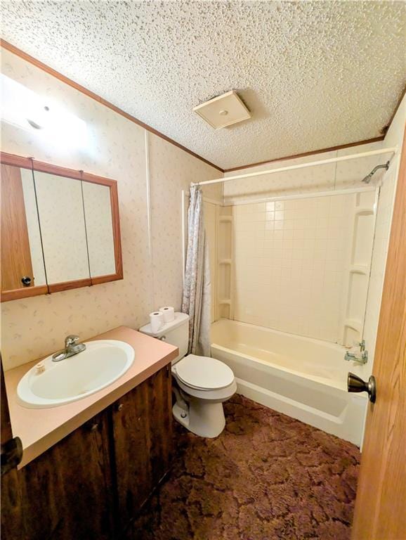 full bathroom featuring crown molding, toilet, shower / bath combo with shower curtain, vanity, and a textured ceiling