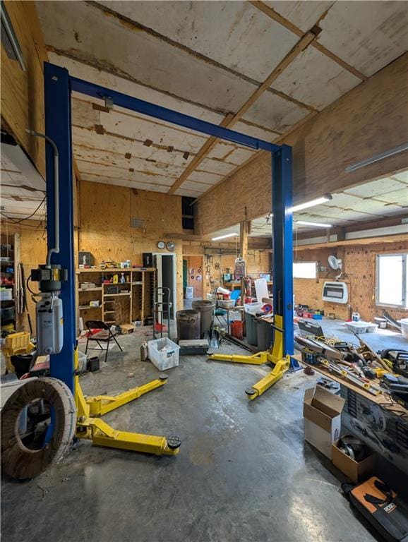 garage with a workshop area