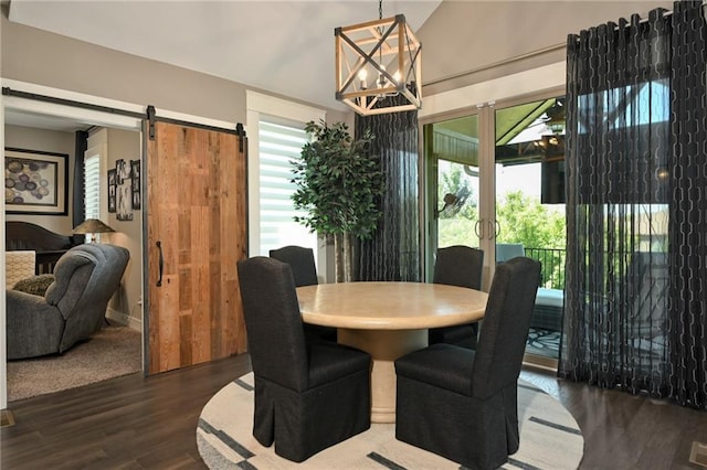 16812 Gillette St, Overland Park, KS 66221 - dining space with dark wood finished floors, healthy amount of natural light, a chandelier, and a barn door