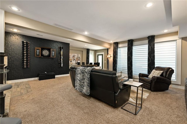 16812 Gillette St, Overland Park, KS 66221 - carpeted living room with recessed lighting, healthy amount of natural light, and baseboards