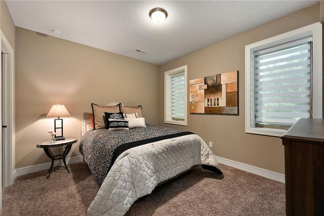 16812 Gillette St, Overland Park, KS 66221 - carpeted bedroom featuring baseboards